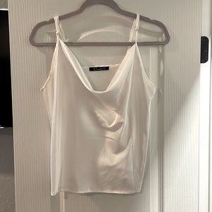 Silk dressy top/ barely worn/ Selling because I ordered the wrong size.